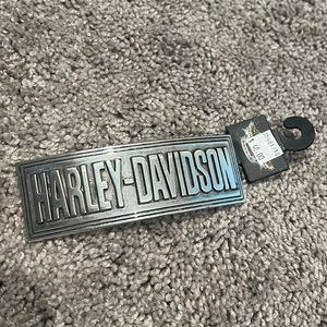 A Harley Davidson belt buckle.